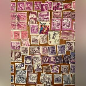 Vintage international & USA Postal Stamps - over 100 postmarked. Pink/Purple#1